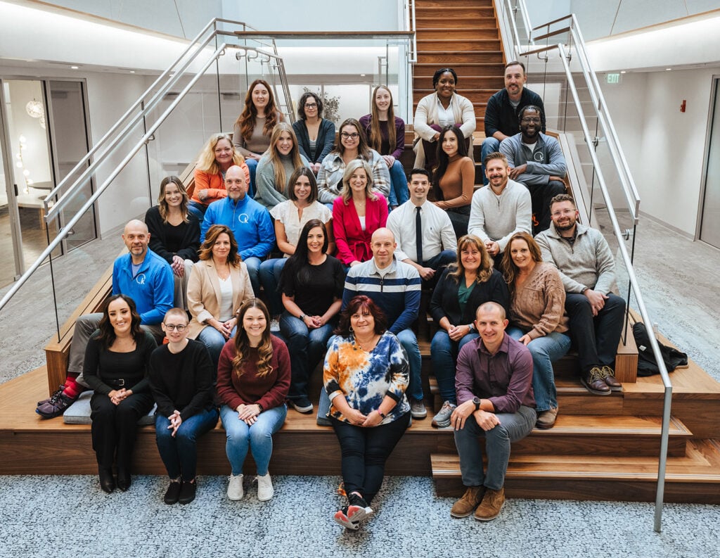Photograph of Knowledge Services employees on staircase celebrating Day of ThanKS 2023.