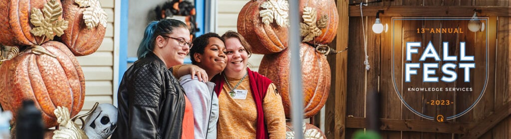 Photo of three young women at Knowledge Services' 13th Annual Fall Fest.