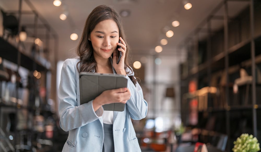 image-of-business-woman-working-on-a-tablet