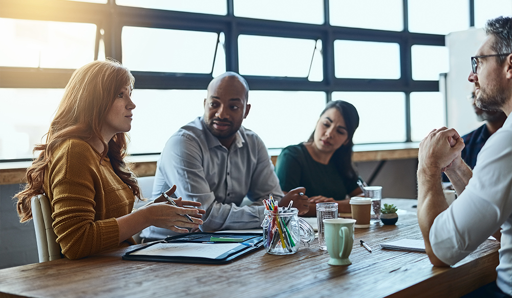 image-of-a-group-of-business-colleagues-in-the-office-having-a-meeting