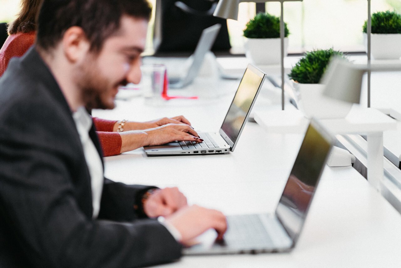 Image of man working on laptop