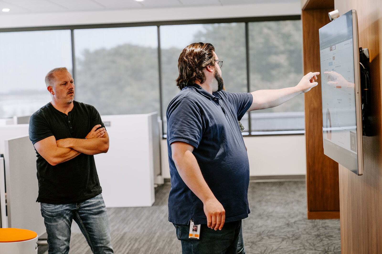 Image of two men discussing business