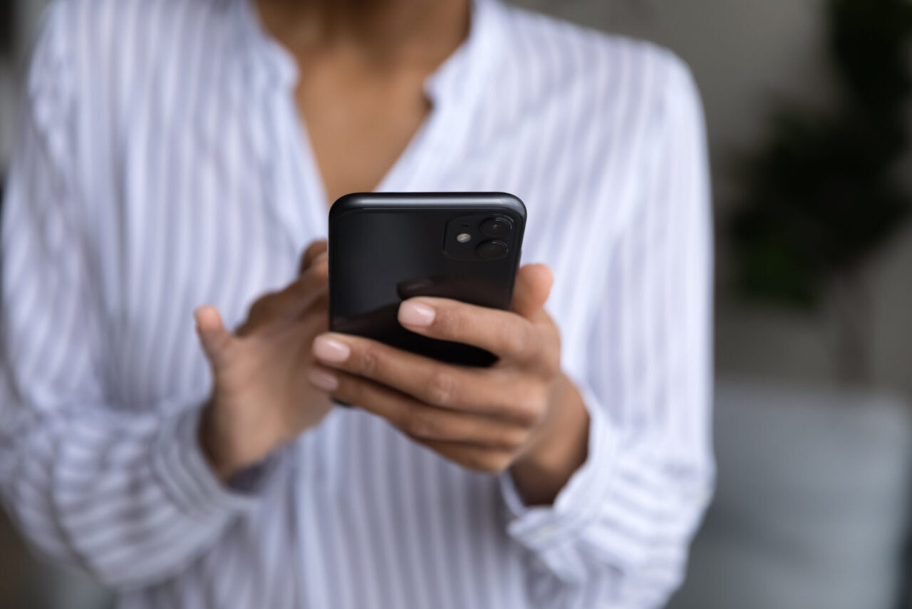 Image of woman using mobile phone