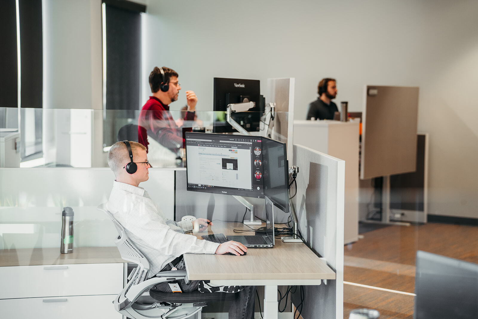 People on a video call in an office.